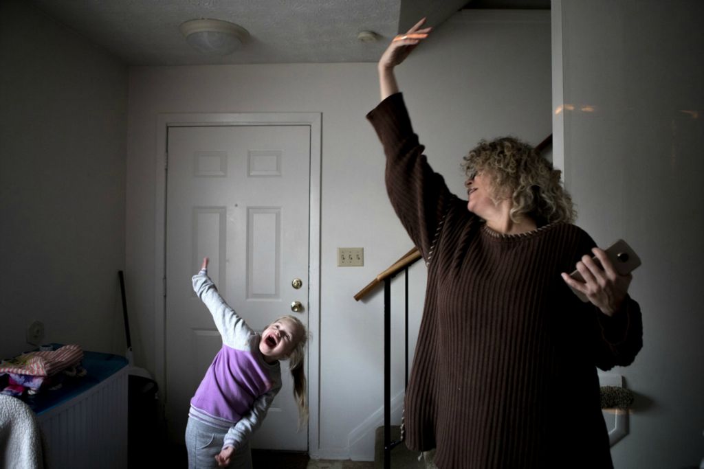 First Place, Feature Picture Story - Jessica Phelps / Newark Advocate, “Living on Love”Dancing in the kitchen with her daughters is just one of the many ways Leah Hrebluk shows her love and sense of adventure by trying to make every moment count. November 14, 2020. 
